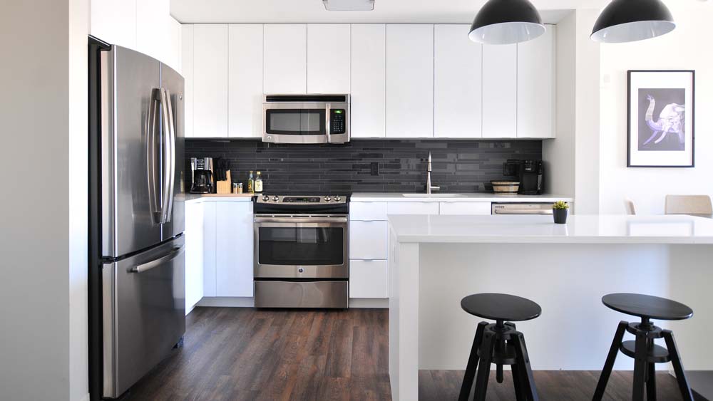 A bright, modern kitchen with a microwave