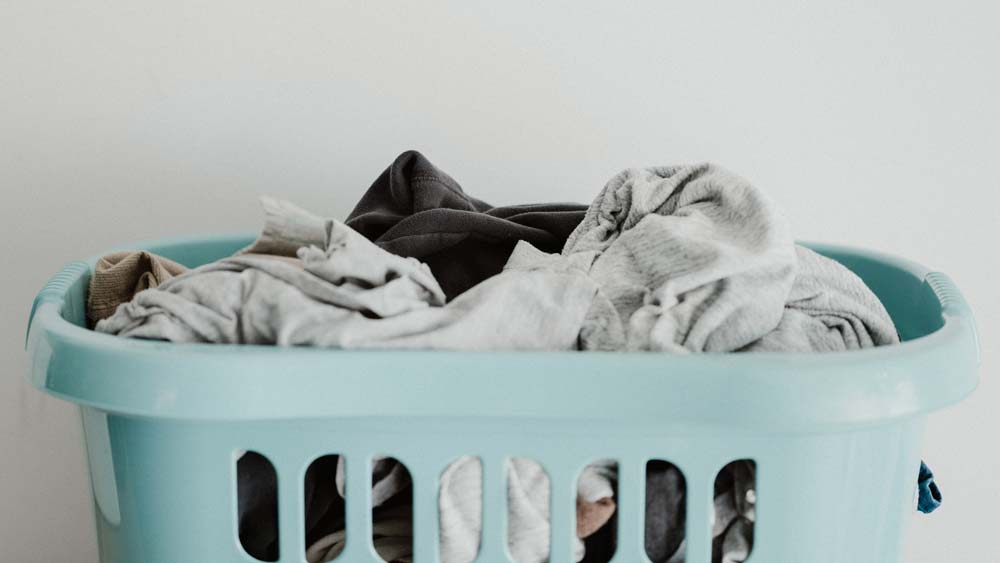 A blue laundry basket